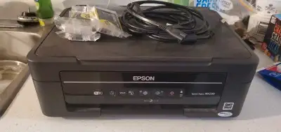 I have an Epson all in one printer scanner and copier. I have just upgraded. Pick up only. Comes wit...