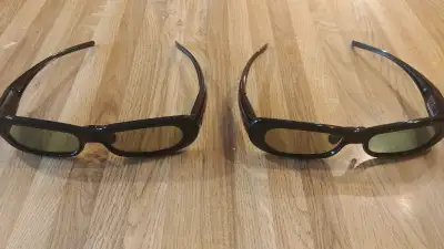 LG TV AGS250 PLASMA TV 3D GLASSES, NEVER BEEN USED AG-S250, comes with charging cable. These glasses...