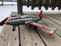 Vintage antique tin jet airplane toy made in Japan 