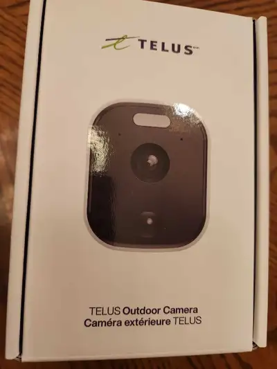 This is a new, Telus outdoor security camera that provides peace of mind with its high-definition vi...