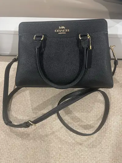 Woman’s Coach purse, View more