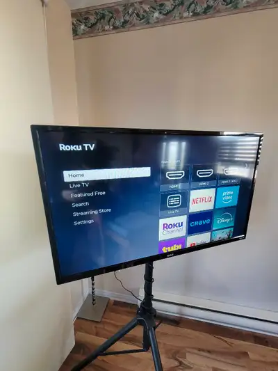 $375 all included (TV stand, remote, cover) or best offer. Model # RTR3260-B-US 32 in English/frança...
