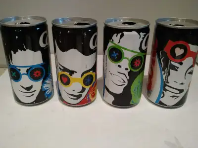 Coca-Cola collectors I have 4 Coke Sunglasses collection cans (280ml from 1990) - opened at top