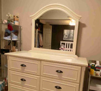 White solid wood dresser with mirror. 