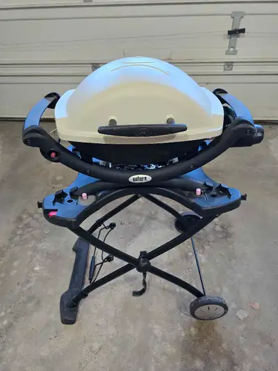 Weber portable bbq and cart. Needs a good clean but in good working condition. $450 new for this set...