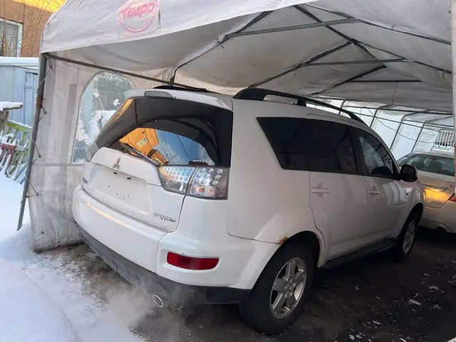 Automatic 4WD 2.4L Quebec inspection or EXPORT64959945369986121