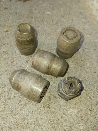 ANTI-THEFT for winter snow tires on your car. Older Vintage early 80's Lug Lock nuts and wrench key....