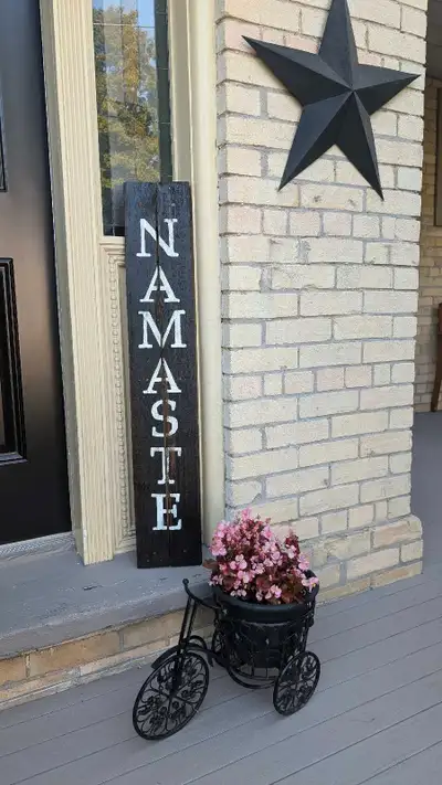 Handmade NAMASTE wood sign with dark walnut stain and white distressed lettering. Clear coated for e...