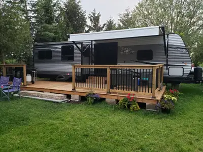 2020 Jayco has King size bed in master, king size pull out couch. Sit by the fireplace on heat/massa...
