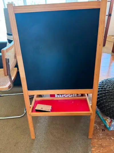 Older version of IKEA Mala Easel. This has been well loved by my kids so there are marks on it. $10