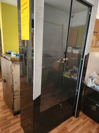 7' retail display. Keyed glass doors and storage drawer