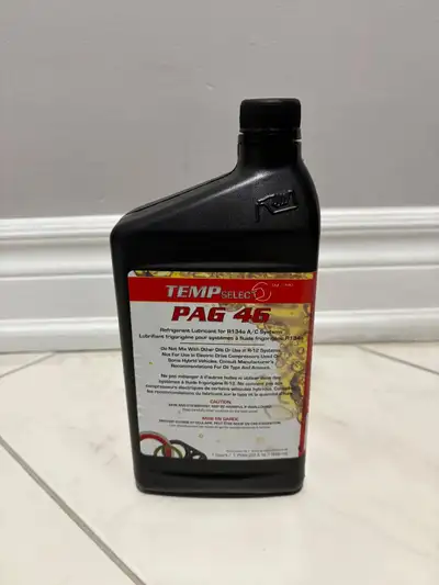 Opened bottle (95% remaining) of Temp Select PAG 46 Refrigerant Lubricant for R134a A/C systems. Thi...