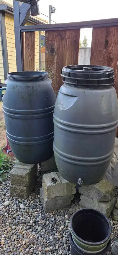 2 food grade plastic barrels with taps, View more