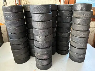 60 Used Hockey Pucks, View more