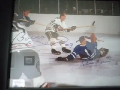 Toronto Maple Leafs autographed Johnny Bower and Bobby Hull framed picture. Picture includes sticker...