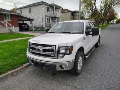 2014 Ford f150 XLT. 5l V8, 4x4 with 6spd automatic, 8ft bed. Power Seat, Power pedals, tow mirrors....