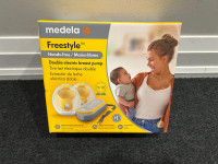 Medela freestyle hands free double electric breast pump. New 