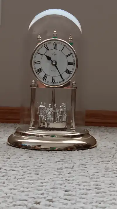 This Ergo Quartz Anniversary Pendulum Clock — a beautiful collector’s piece that’s fully operational...