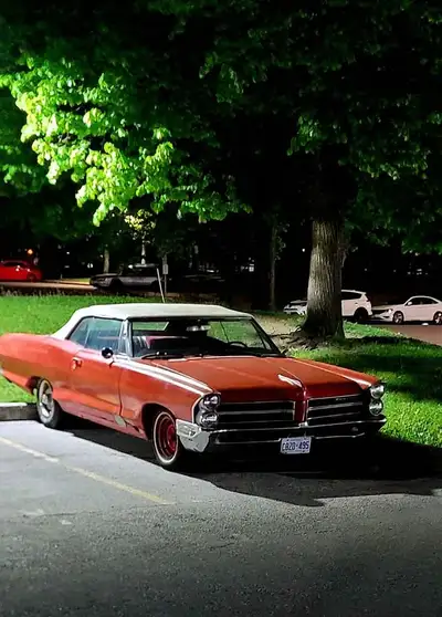 1965 Pontiac Parisienne convertible needs floor work; the frame is solid, and the interior is good....
