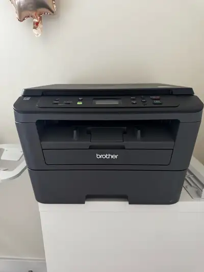 Brother laser printer DCP L2520DW, prints letter and legal size.