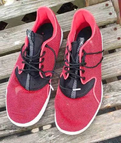 Step up your shoe game with these Jordan red running shoes, perfect for adding a pop of color to you...