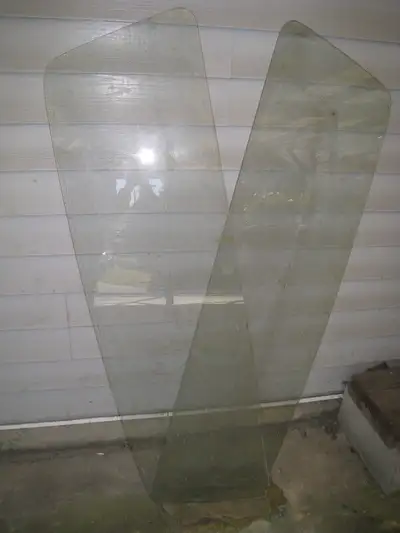 Two pieces of car rear window glass, same size. I don’t know the car model or the years these would...