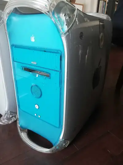 Vintage Apple Power Mac G3. Features a translucent blue case. Includes Mac OS X. PowerPC G3 processo...