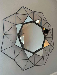 Unique mirror with metal frame.