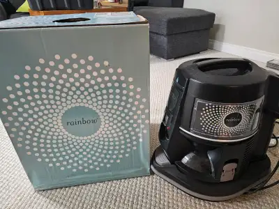 Rainbow Vacuum with all the attachments no filter needed just water.