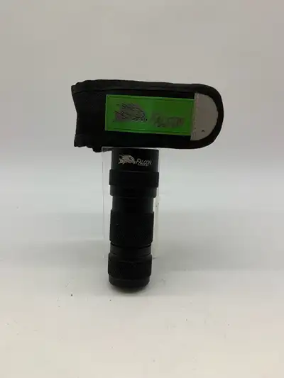 Compact Falcon flashlight with case. • LED light • Portable and durable • Battery included (may need...