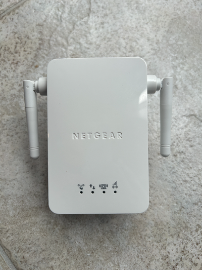 A used Netgear Universal Wifi Range Extender, Model WN3000RP in excellent condition. Includes Range...