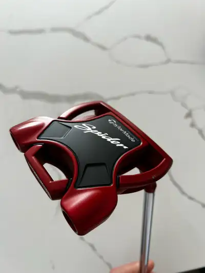 Up for grabs is a gently used Taylormade Spider Putter, known for its exceptional balance and alignm...