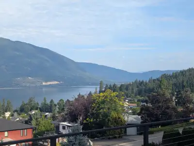Lake view, large sunny main floor of house with large deck in nice Salmon Arm neighborhood. Parks an...
