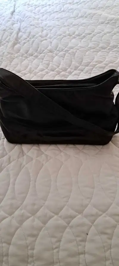 Danier black leather purse, View more