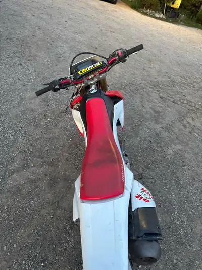 Honda crf 250L runs mint and has been lightly used mostly run back and forth between side roads and...
