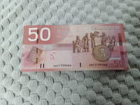 50 canadian bills    75$