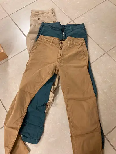 3 pairs of American Eagle Pants - Beige, Khaki and Blue/ 31" waist and 32" length. Smoke free home....