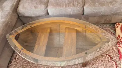 Boat shape coffee table. Measurements H-19inches L-52inches W-25'1/2inches