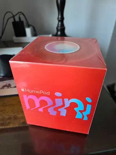 I'm selling a brand new, un-used Apple HomePod Mini in the vibrant orange colour! This smart speaker...