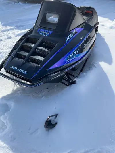 Get ready to carve through the snow with this 1993 Polaris XLT Indy 580 Spl, a true classic snowmobi...