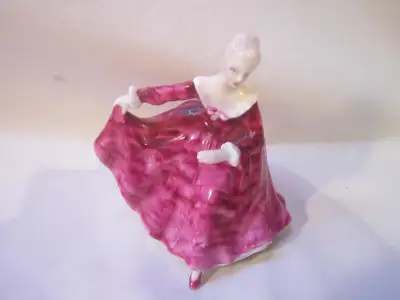 This small figurine is in good used condition with no damage. She measures 3&1/2 inches tall, 3 inch...