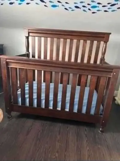 Comes with brand new mattress and clean sheets. Converts into toddler bed (have not tried)