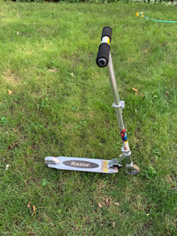 Scooter by Razor for kid (adjustable height)