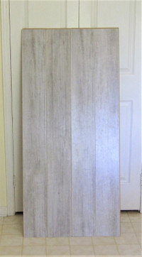 Thirteen Light Grey Wood Laminate Floor Plank Each One 54.5" L.