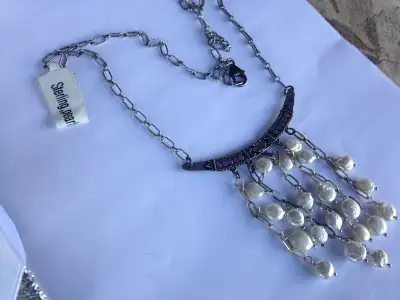 Sterling silver real pearl necklace [ stamped 925] ...20 inches.... $100. cash.only....Come for pick...