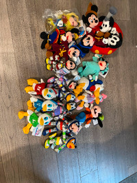 Lot of 26 different Disney collectible  beanies - new with tags