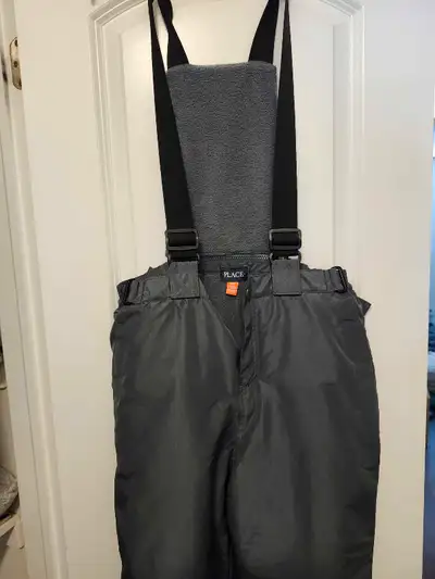 Never worn children's place snow pants size 14. $50. Pick up in welland.