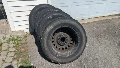 Set of four Hankook Winter I*Pike RSV tires on steel rims. Perfect for a Dodge Grand Caravan - 16" w...