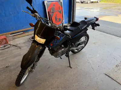 2017 Suzuki DR200 dirt bike, street legal. Under 2000km. In great shape and runs perfect. Stored in...