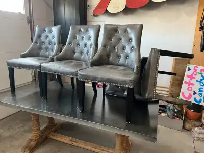 Dining table with metal top (distressed) and solid wood base. This is a heavy table. Dimensions: 78”...